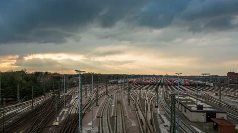 Freight depot in evening with cloudy sky timelapse Hamburg Maschen Stock Footage 62402811