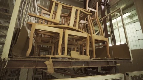 Freight elevator with chairs Stock Footage 128368442