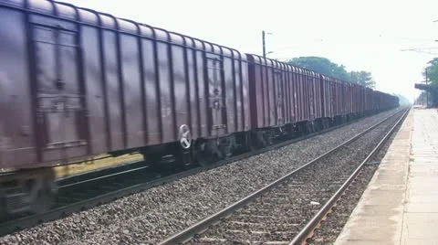Freight Goods train passes through station in India Stock Footage 21251600