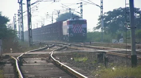 Freight Goods train passes through station in India Stock Footage 21645357