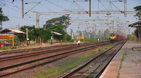 Freight Goods train passes through station in India Stock Footage 21645962
