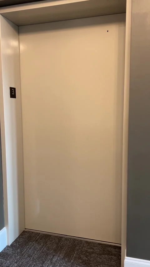 Freight moving elevator with protection pads door opening and closing Stock Footage 278119027