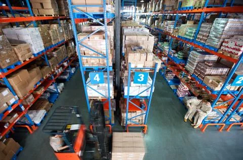 Freight Stacking 20 to 30. Oriental Young men Check Staff Overalls The Blue Man Stock Photos