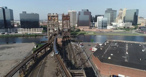 Freight tracks and lift bridge beside the Newark riverfront Vídeo Stock 90319982