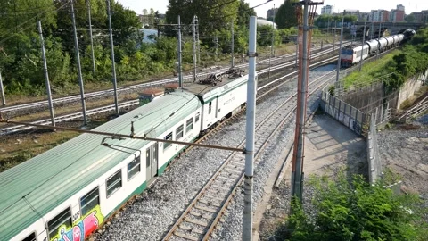 Freight train and passenger train cross each other Stock Footage 162184631
