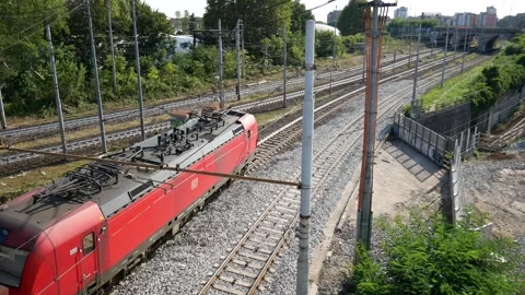 Freight train and passenger train cross each other Stock Footage 290033682