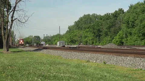 Freight Train approaching at high speed Stock Footage 81922517