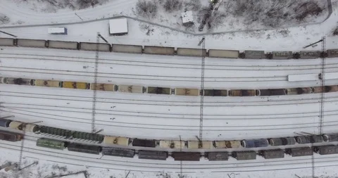 A freight train arrives the station Stock Footage 99845025