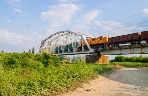 Freight train on the bridge Stock Photos