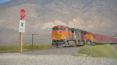 Freight train in California desert Stock Footage 9532040