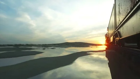 Freight train with cargo containers. Against Sunrise. logistic concept. Stock Footage 73242690
