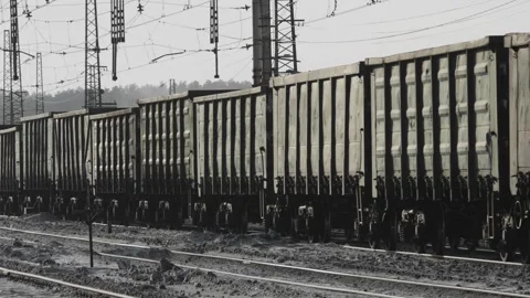 Freight train with cargo containers passes by a camera. moving freight train Stock Footage 301420492