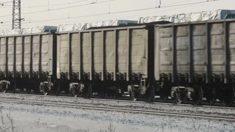 Freight train with cargo containers passes by a camera. moving freight train Video stock 301420504