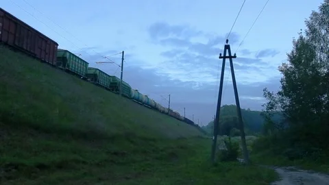 Freight train with cargo containers passing by Stock Footage 71518923