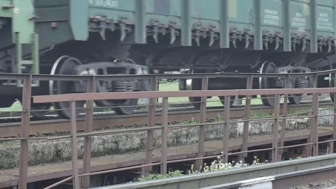 Freight train with cargo containers passing. Railway wagons, Ukraine Stock Footage 75491020