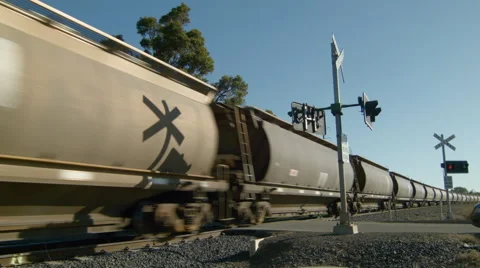 Freight Train Carriages Passing By A Railway Crossing Stock Footage 45599105