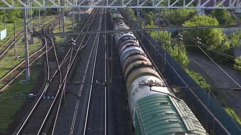 Freight train carries cargo. View of the train from above. Rail transport for Stock Footage 132222163