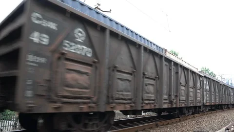 A freight train carrying containers runnning on the rail in Beijing Stock Footage 93891554