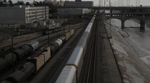 Freight train carrying storage containers through downtown Los Angeles Stock Footage 59583216