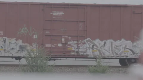 Freight Train Carts Passing By Stock Footage 154005071