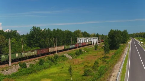 Freight train with cisterns and containers on the railway. Aerial view Container Stock Footage 90066748