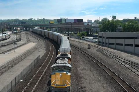 Freight train in the city Stock Photos