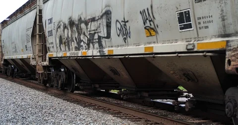 Freight train close up of bulk carriers moving right to left Stock Footage 117937561