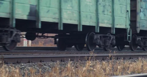 Freight train. Close-up of railway tracks and wheels. Delivery of cargo and Stock Footage 327209073