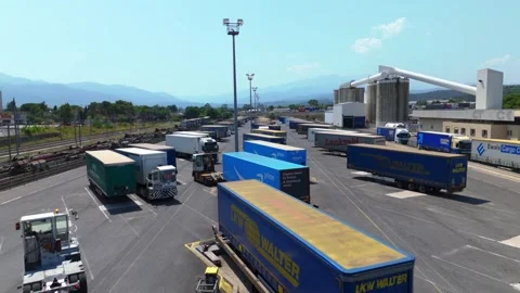A freight train container loading and unloading dock Stock Footage 338371546