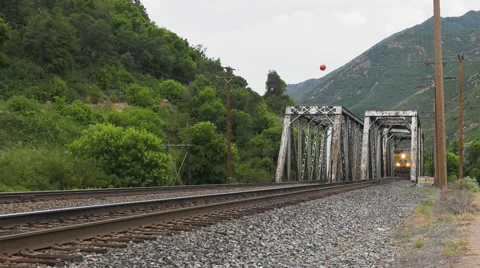 Freight Train Crossing Bridge in Utah Stock Footage 65262478