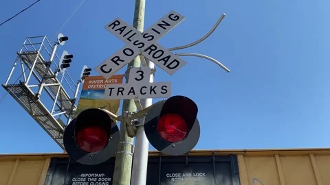Freight train crossing light Stock Footage 256194070
