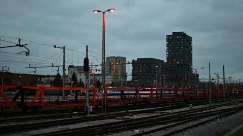 Freight train with empty car carrier wagons passing by Stock Footage 170665742