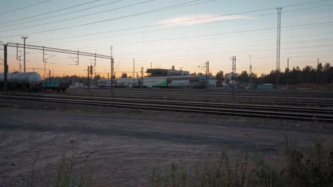 Freight train entering train yard in evening, Kouvola, Finland Stock Footage 345661470