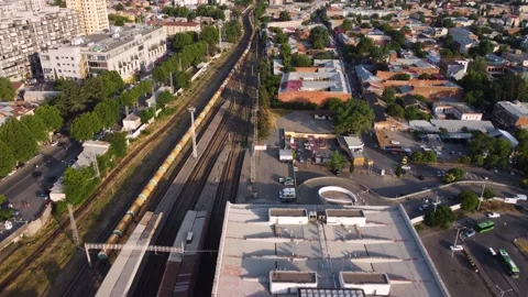 Freight train in the evening city Stock Footage 168618189