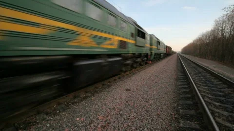 Freight train formation going on rails on gravel to camera Stock Footage 589583