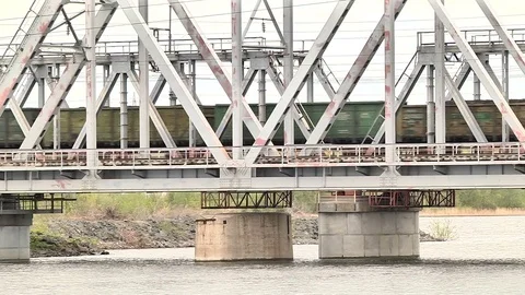 Freight train goes over the bridge Stock Footage 75617381