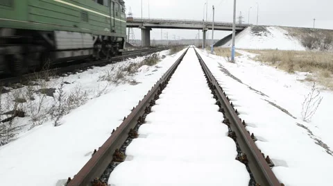 Freight train goes quickly into the distance Stock Footage 43340574