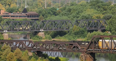 Freight train going across a bridge in downtown Columbus Ohio sept 4 2024 Stock Footage 284369847