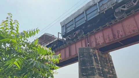 Freight Train Guard Cabin Passing Over Bridge Stock Footage 323083878