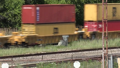 Freight train hauling goods after COVID 19 coronavirus lockdown ends in Canada Stock Footage 132622162