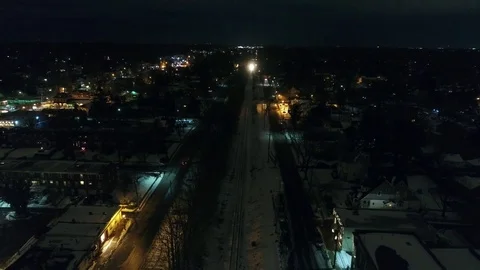 Freight Train Headed towards Philadelphia at Night in Snow Stock Footage 74257961