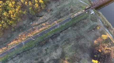 Freight train from a height, a freight train coming into the station, the drone 스톡 동영상 68730509