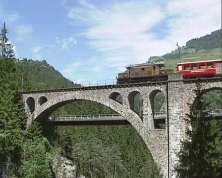 Freight train with historic crocodile loc crossing Solis Viaduct, Switzerland Stock Footage 43823364