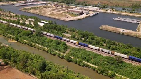 Freight train on industrial area Stock Footage 247232400