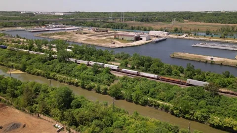 Freight train on industrial area Stock Footage 247232408