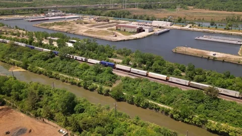 Freight train on industrial area Stock Footage 247232464