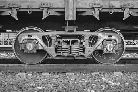 Freight train, iron wheels train close-up, black and white color Stock Photos