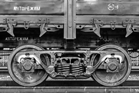 Freight train, iron wheels train close-up, black and white color Stock Photos