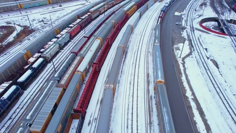 Freight train, laden with cargo along a railway in urban setting. Canadian .. Stock Footage 263685193