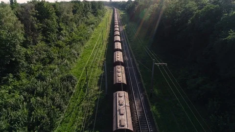 Freight train with laden wagons.  Video stock 96443639